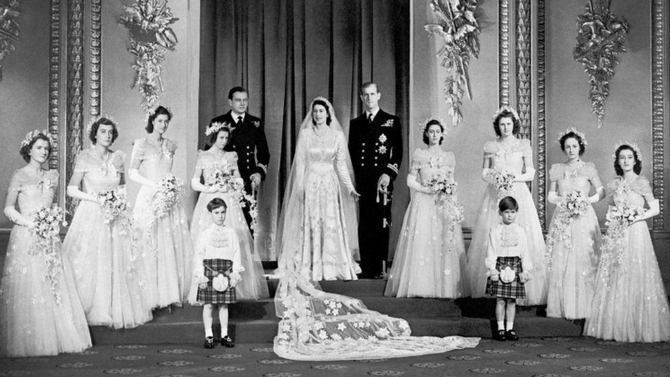 The Queen and Prince Philip with the bridal party at Buckingham Palace on their wedding day.