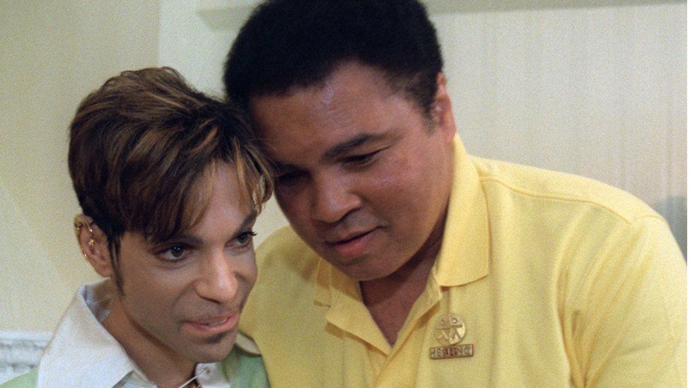 Boxing great Muhammad Ali, right, embraces the Artist Formerly Known as Prince, during a meeting in Washington Tuesday, June 24, 1997