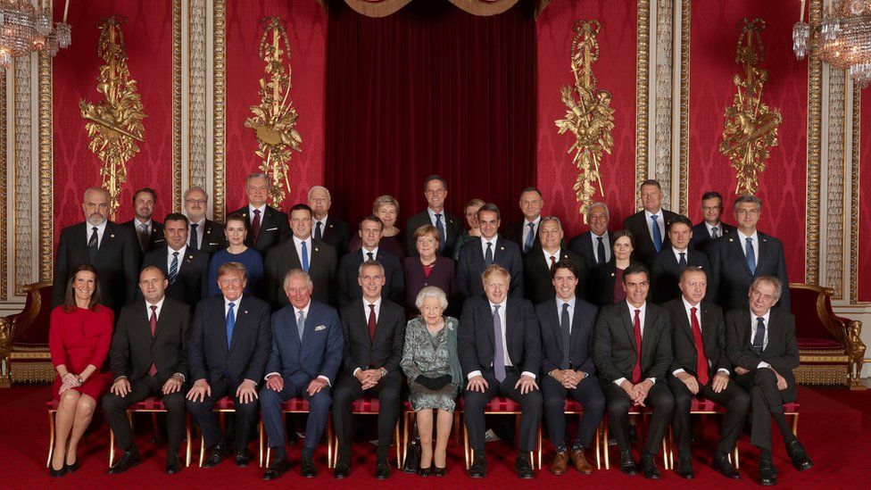 Leaders of Nato alliance countries, and its secretary general, join Britain's Queen Elizabeth and the Prince of Wales
