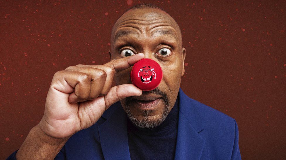 Sir Lenny Henry wearing a red nose