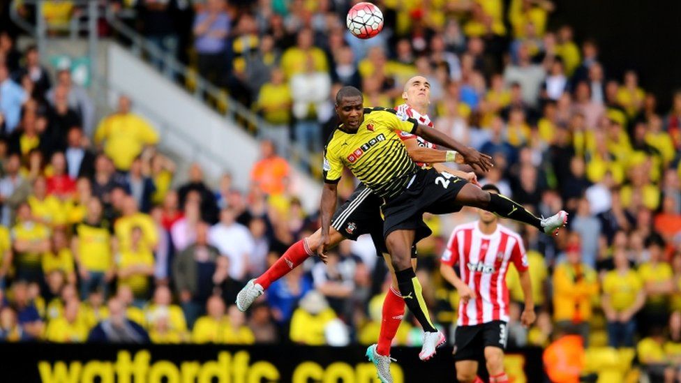 Odion Ighalo of Watford battles with Oriol Romeu of Southampton during the Barclays Premier League match between Watford and Southampton at Vicarage Road on August 23, 2015 in Watford, United Kingdom