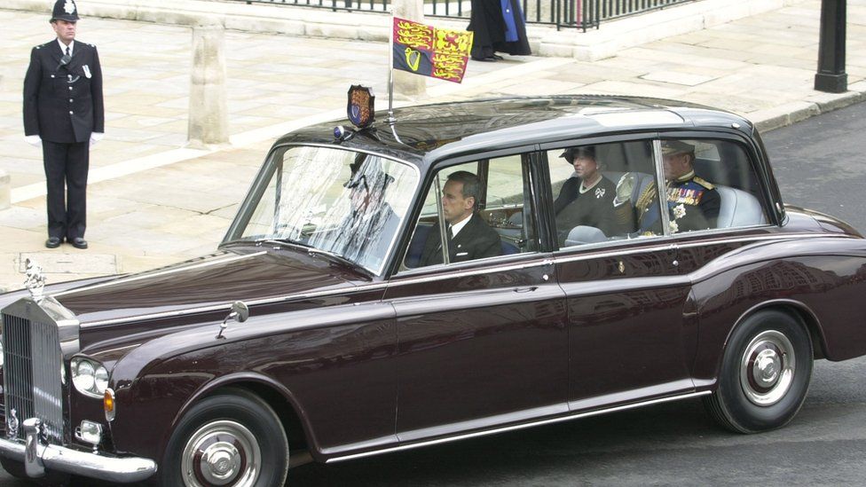 The Queen and Prince Philip depart Westminster Abbey following the funeral service of the Queen Mother