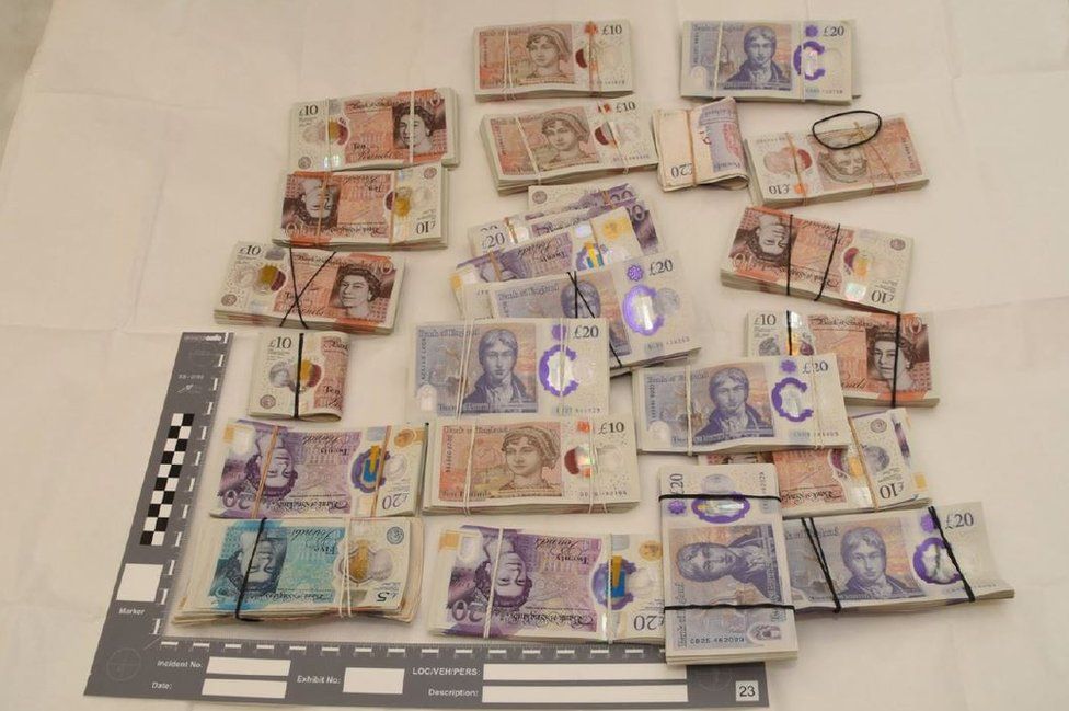 Bundles of cash recovered by police