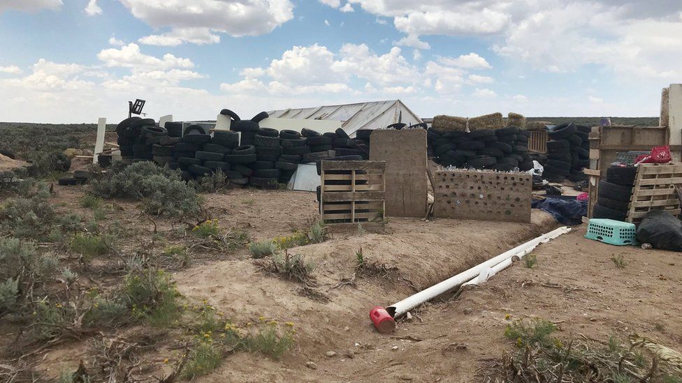 A view of the compound in rural New Mexico where 11 children were taken in protective custody after a raid by authorities near Amalia, New Mexico, on 10 August 2018.