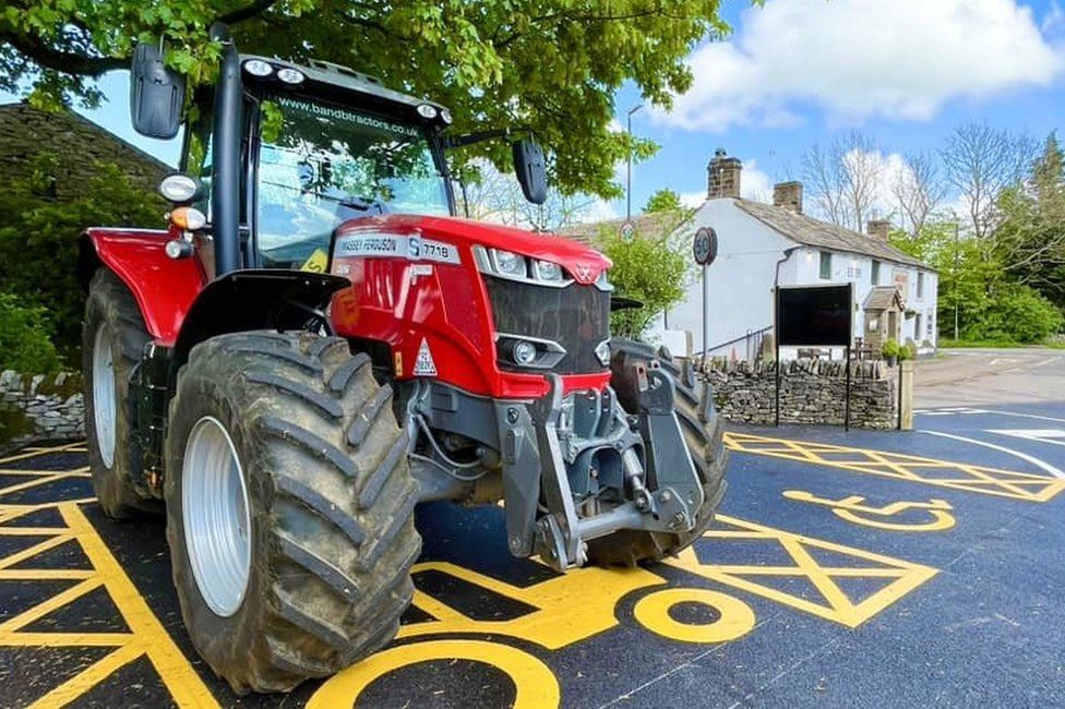Tractor parked outside pub