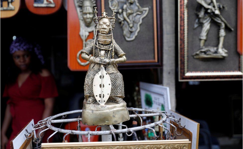 A bronze work is displayed for sale in front of a shop in Benin City, Edo state, Nigeria (photo released on 20 June)