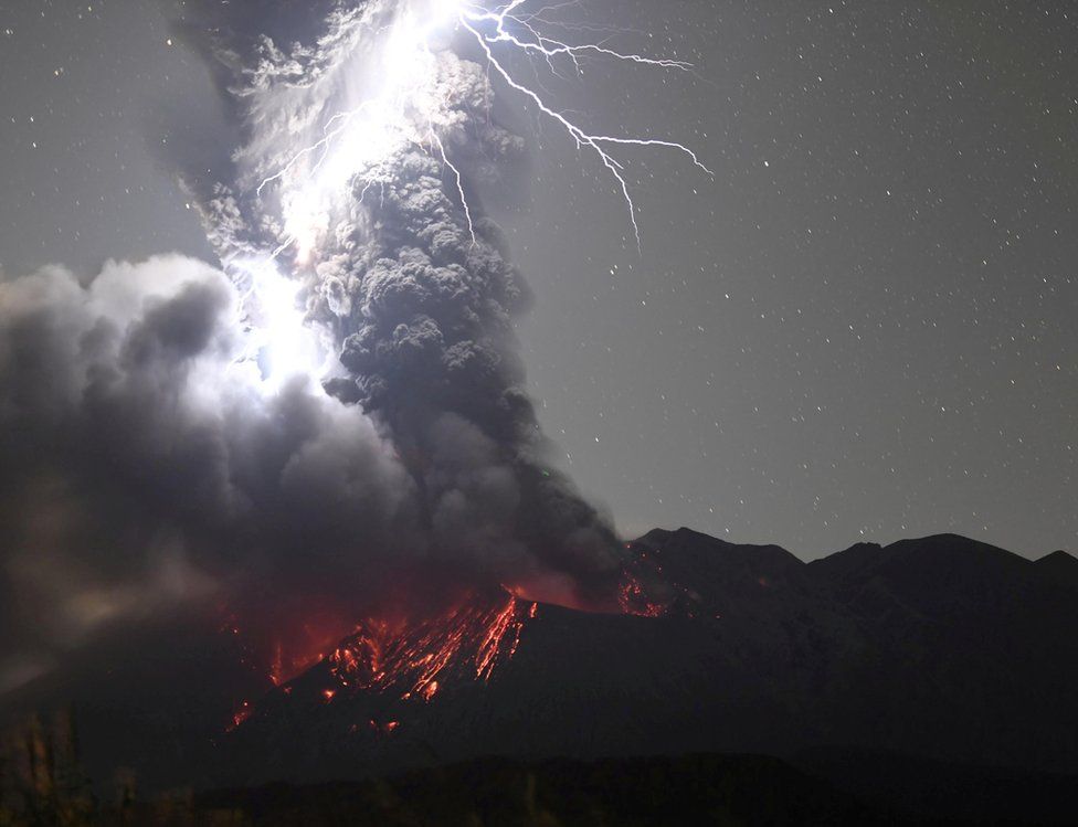 Volcanic lightning over Mount Sakurajima is pictured from Tarumizu city, Kagoshima prefecture, Japan, 17 December 2020