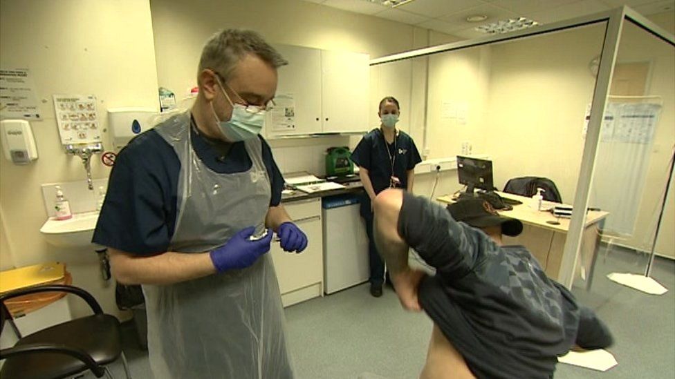 Phil having an injection