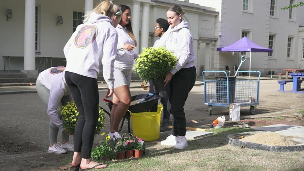 Students putting garden together