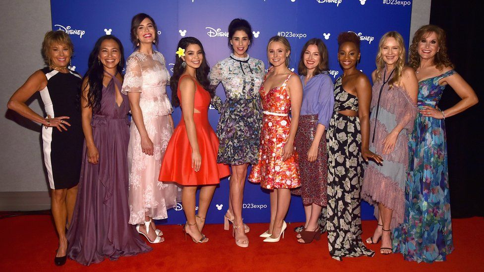 Paige O'Hara (Beauty and the Beast), Irene Bedard (Pocahontas), Mandy Moore (Rapunzel), Auli'i Cravalho (Moana), Sarah Silverman (Wreck It Ralph), Kristen Bell (Frozen), Kelly Macdonald (Brave), Anika Noni Rose (The Princess And The Frod), Linda Larkin (Aladdin), and Jodi Benson (The Little Mermaid)