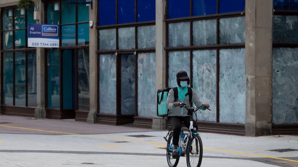 A courier cyclist in Cardiff during lockdown