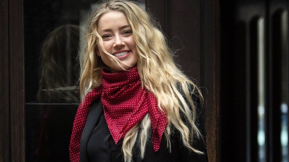 Actress Amber Heard arrives at the High Court in London for a hearing in Johnny Depp's libel case against the publishers of The Sun and its executive editor, Dan Wootton.