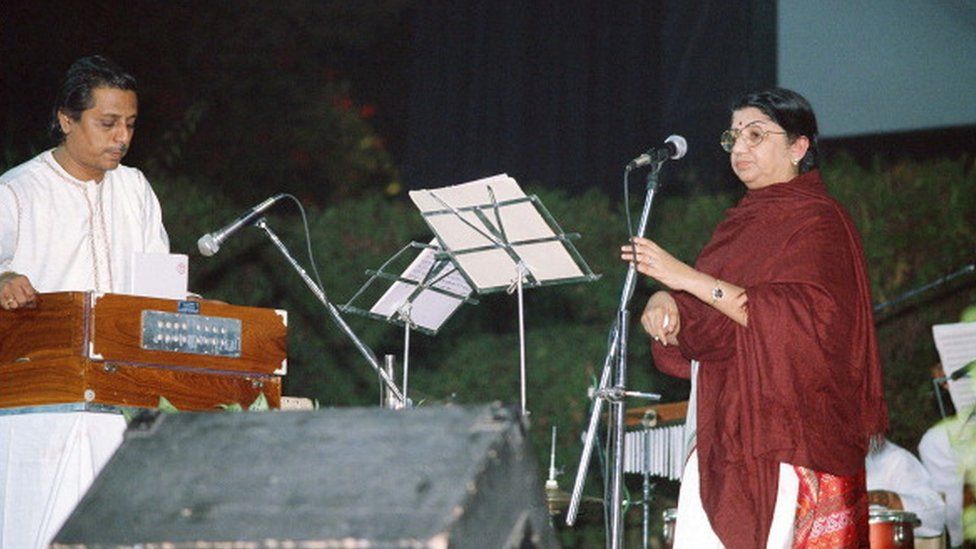 Singer Lata Mangeshkar performing at a function.(Photo by Pramod Pushkarna/The India Today Group via Getty Images)