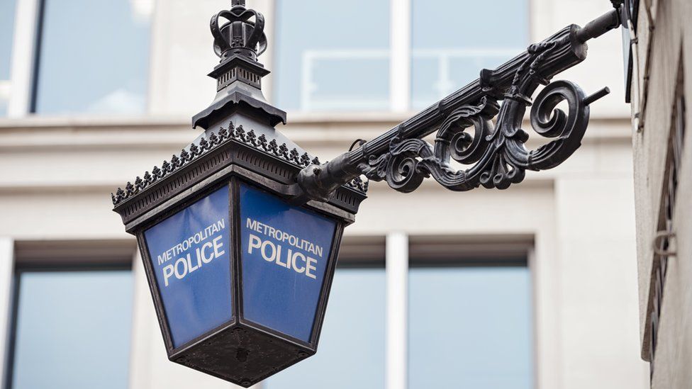 Close-up of a traditional Met police lantern, on display outside a police station