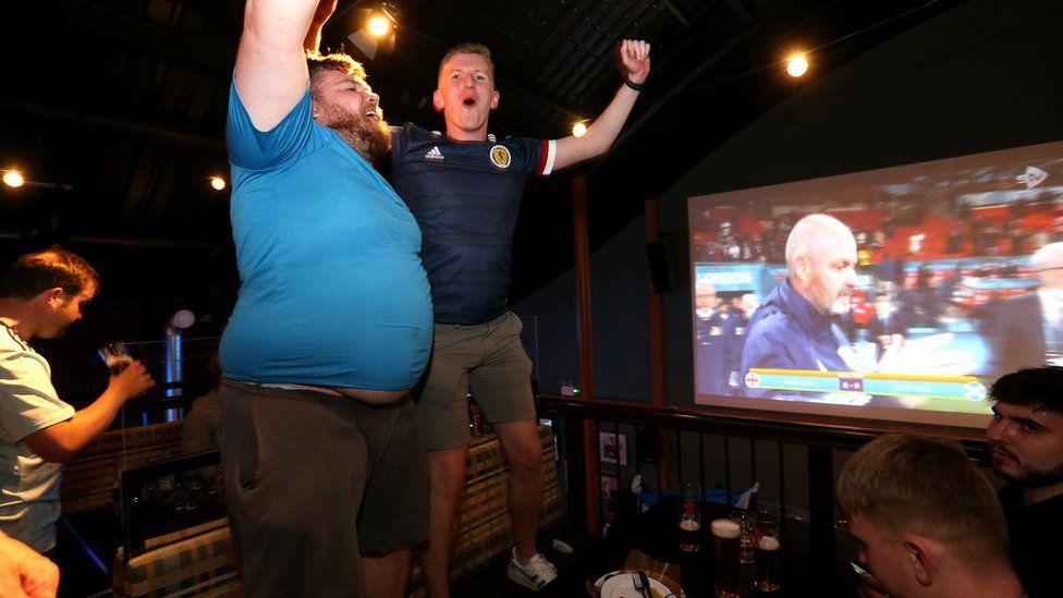 Scotland fans celebrate game in Glasgow pub