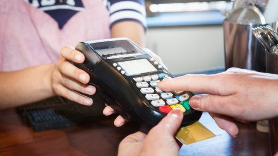 Card payment being made through a processing device