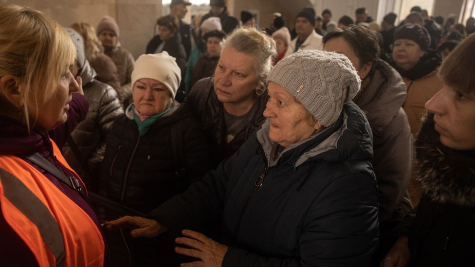 Kherson residents at the railway station, waiting to be evacuated