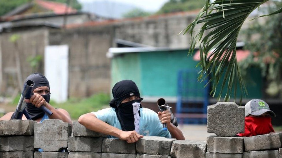 Demonstrators hold homemade weapons at a barricade during a protest against the government of Nicaraguan President Daniel Ortega in Masaya, Nicaragua June 19, 2018.