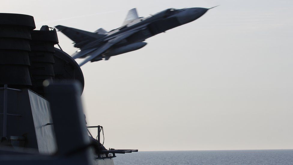 Russian Sukhoi Su-24 aircraft makes low pass by USS Donald Cook
