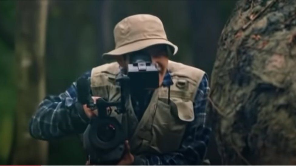 A scene from an advertisement for Seoul Milk. The 52-second video begins as a male explorer with a camera wanders through the mountains.