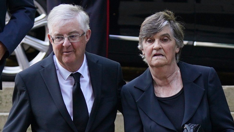 Wales's First Minister Mark Drakeford and wife Clare arriving at Llandaff Cathedral in Cardiff, for a Service of Prayer and Reflection for the life of Queen Elizabeth II. Picture date: Friday September 16, 2022. PA Photo. See PA story DEATH Queen. Photo credit should read: Jacob King/PA Wire
