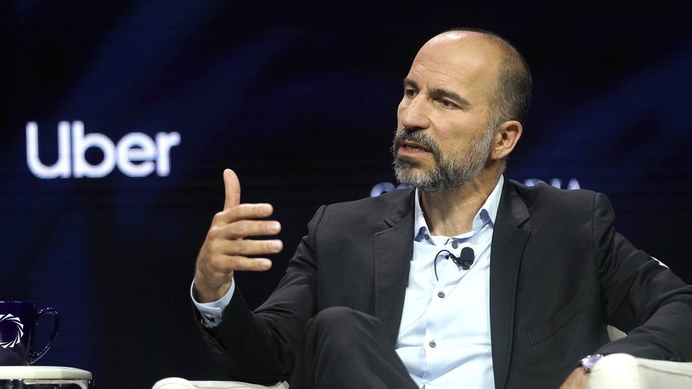 Uber CEO Dara Khosrowshahi is speaks onstage at a summit
