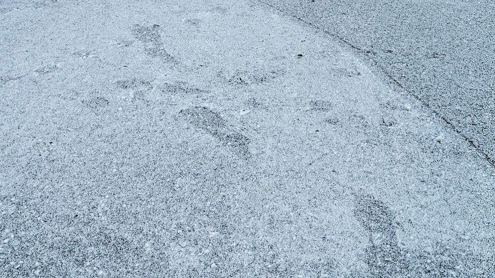 Footprints in the frost on frozen Paddy Freeman's lake