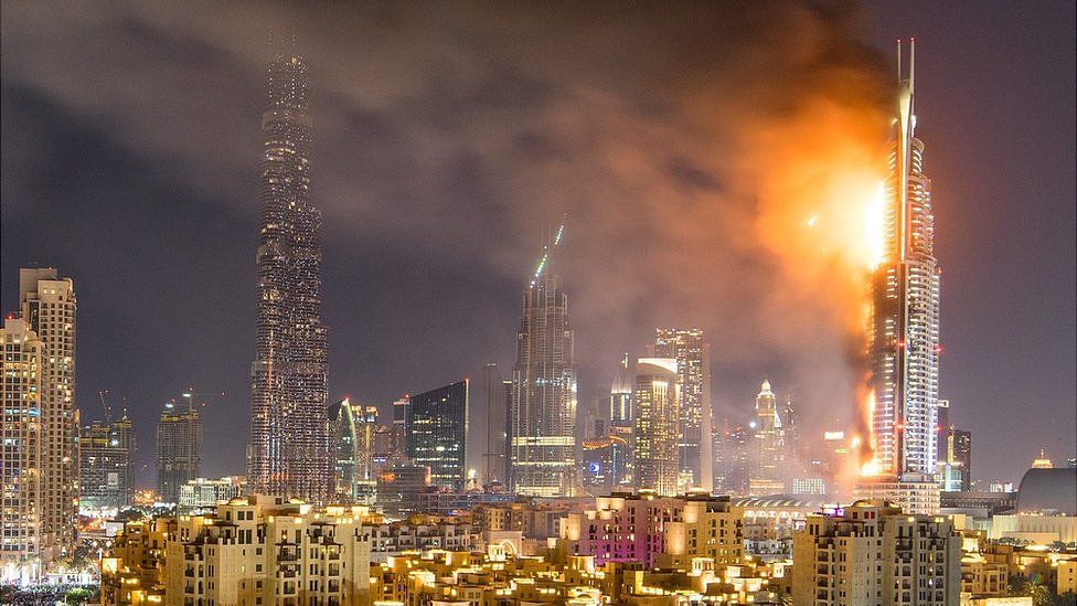 Smoke billows from the Address Hotel in Dubai, on January 1, 2015
