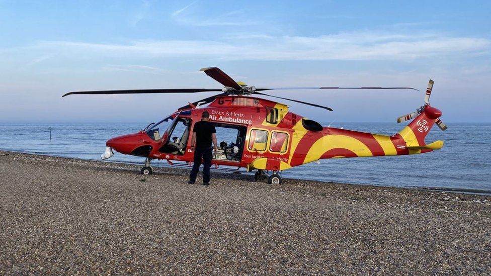 Air ambulance helicopter on beach