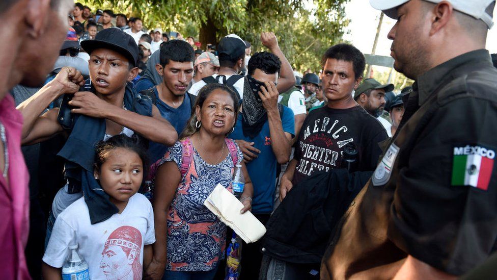 Central American asylum seekers confronted by Mexico security officials last month