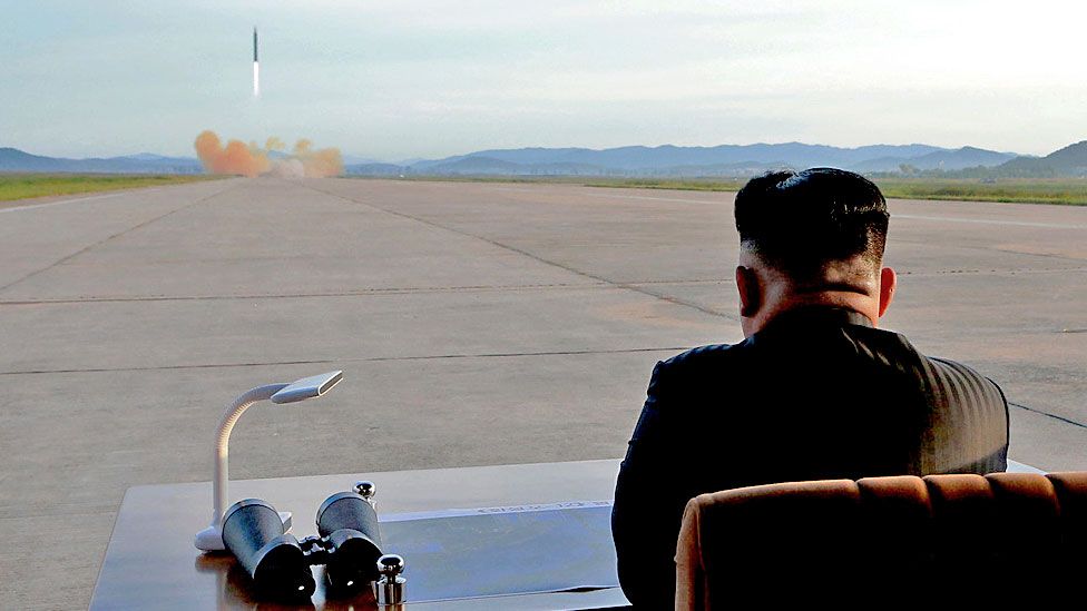 North Korean leader Kim Jong-un watches the launch of a Hwasong-12 missile in September 2017