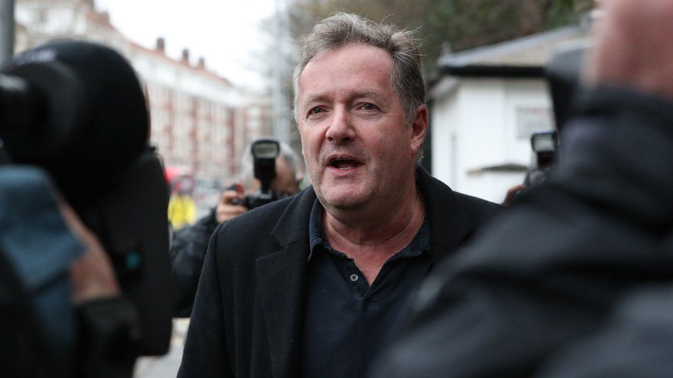 Piers Morgan outside his west London home
