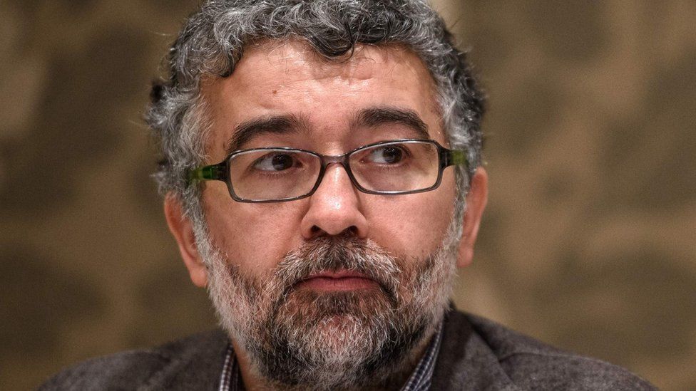 A picture taken on 2 March 2016 shows Erol Onderoglu, the Turkey representative for international rights group Reporters Without Borders (RSF), during a press meeting in Istanbul.