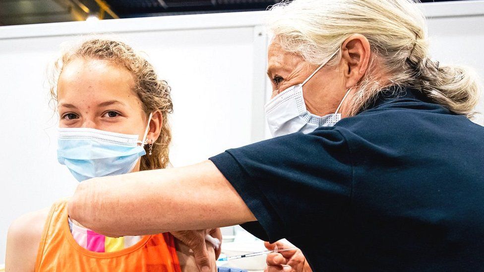 Child being vaccinated in the Netherlands