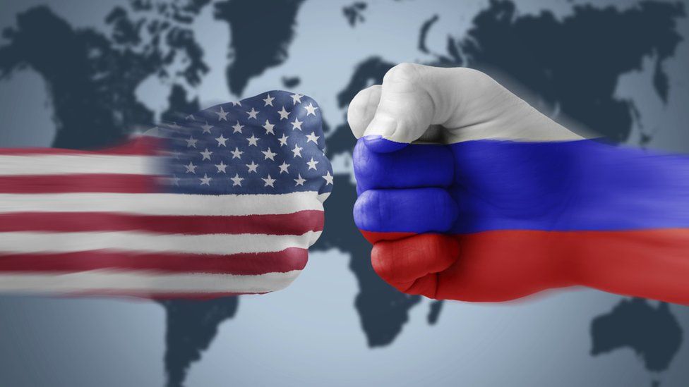 US v Russia flags on fists