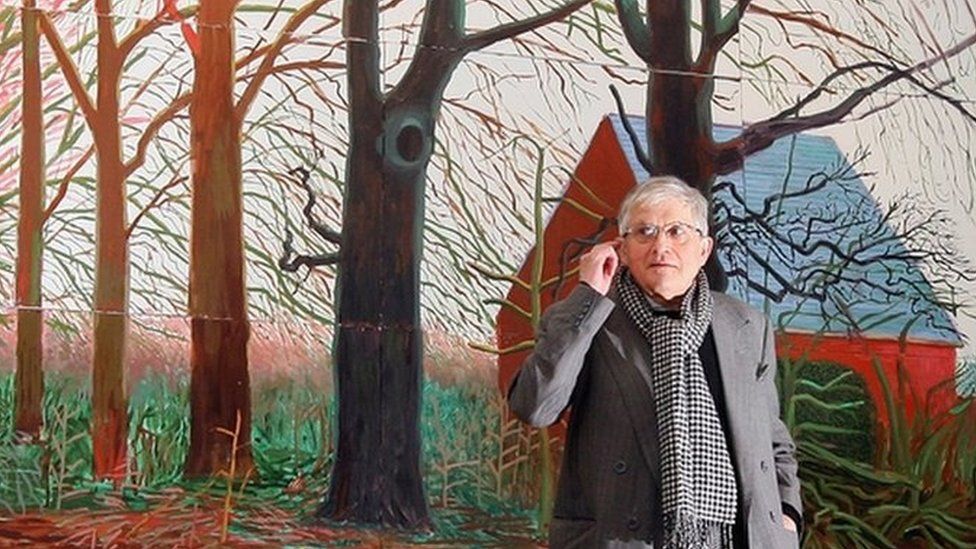 David Hockney in front of "Bigger Trees near Warter"