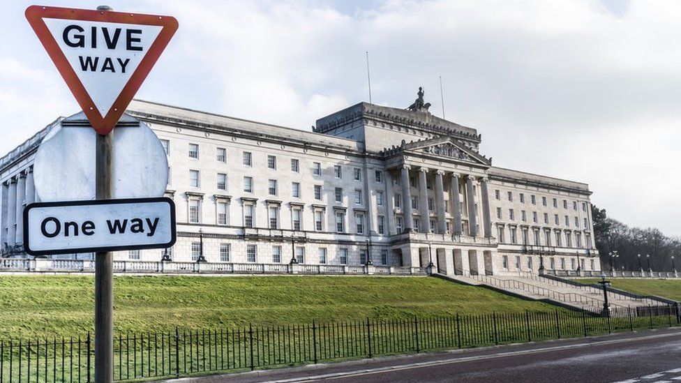 The front of parliament buildings, showing the 'give way' sign