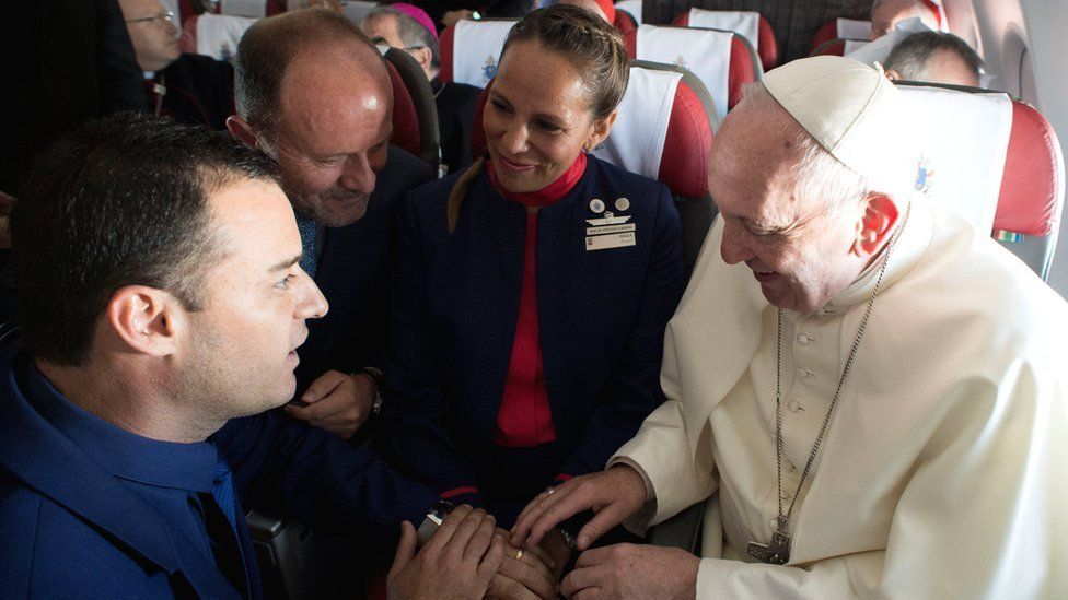 Pope Francis celebrates the marriage of crew members Paula Podest and Carlos Ciufffardi during the flight between Santiago and the northern city of Iquique, 18 January 2018