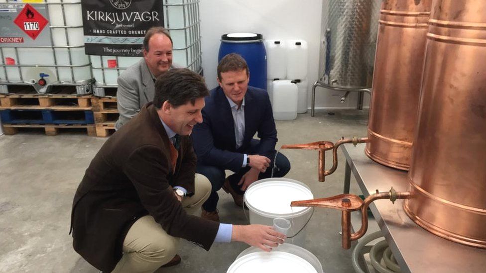 Lord Duncan (front), Jon Clipsham from Emec (back) and Stephen Kemp, from Orkney Distilling (right)