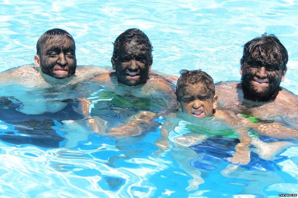 Aceves and family swimming