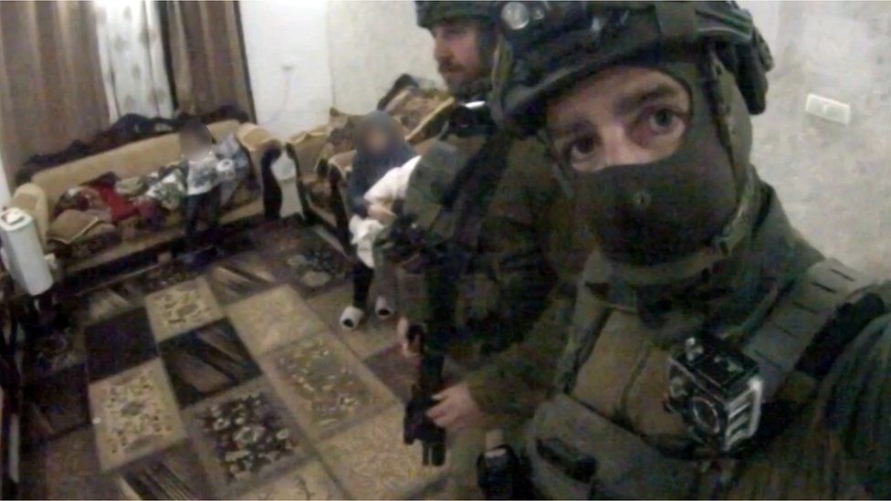 A screenshot from one of Yohai Vazana’s videos in the home of a Palestinian woman and child