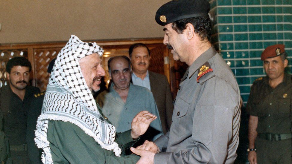 Yasser Arafat (left) with Saddam Hussein (file photo)