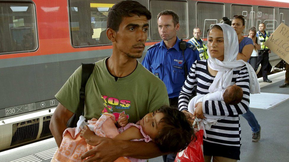 Syrian refugees at Buchs railway station, Switzerland, 1 Sep 15