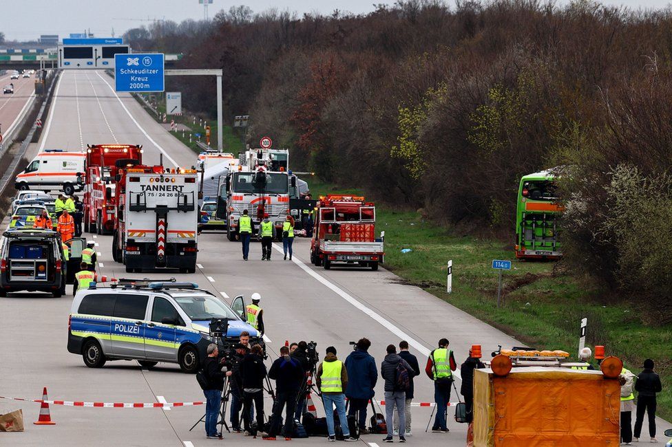 Emergency personnel work at the scene of a bus accident on the A9 highway in Schkeuditz, near Leipzig, Germany, 27 March 2024