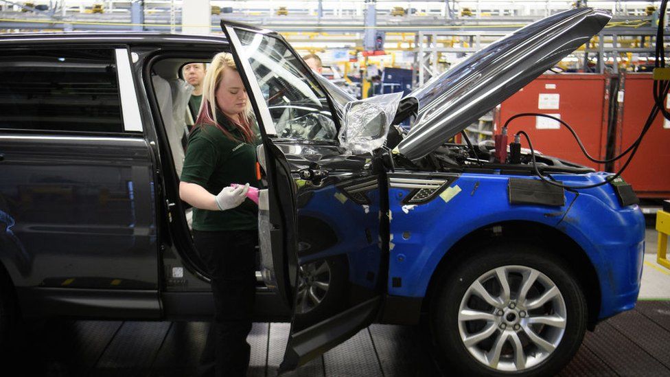 Doors being fitted and checked during production at the Jaguar Land Rover plant in Solihull