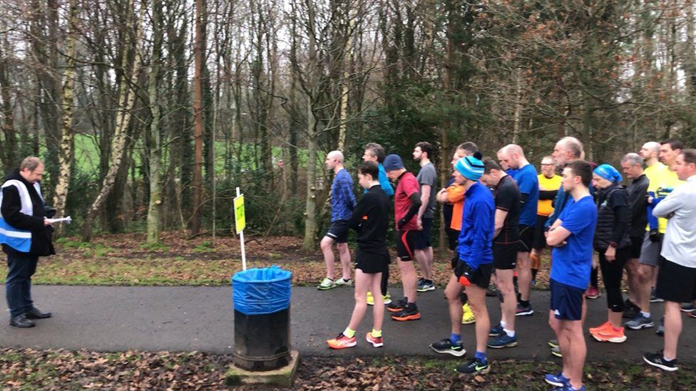 Park Run participants at Orangefield Park in Belfast observe a silence in memory of murdered primary school teacher 23-year-old Ashling Murphy