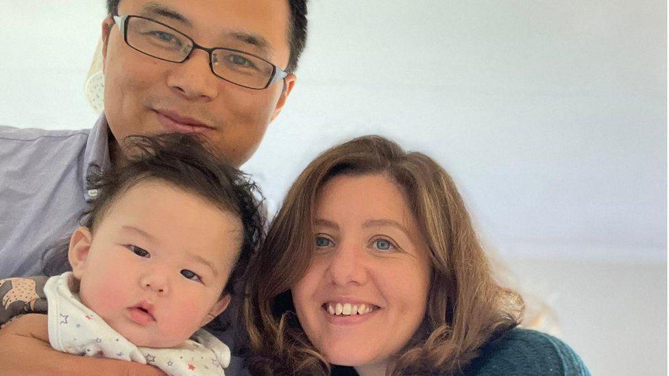 Reuben, with parents Eleanor and Atsushi