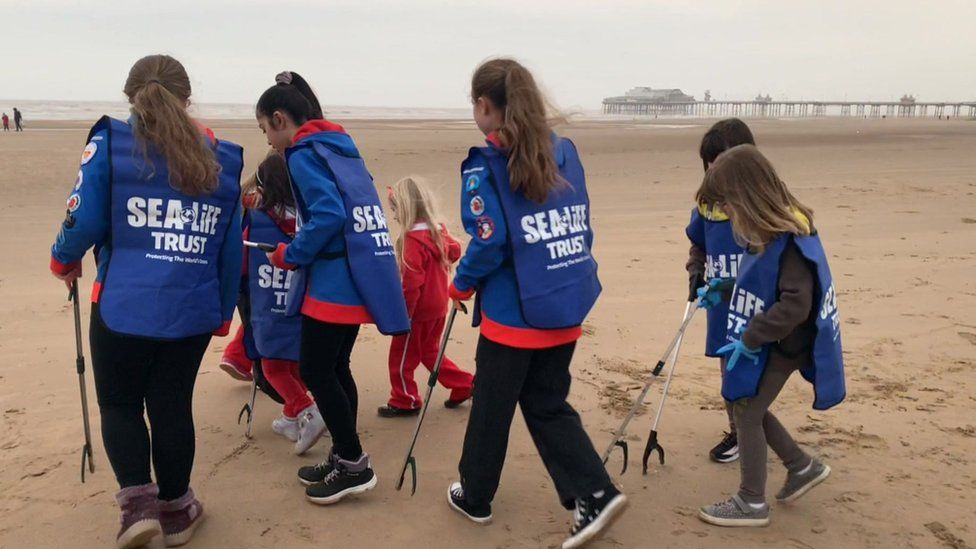 Litter picking on Blackpool beach