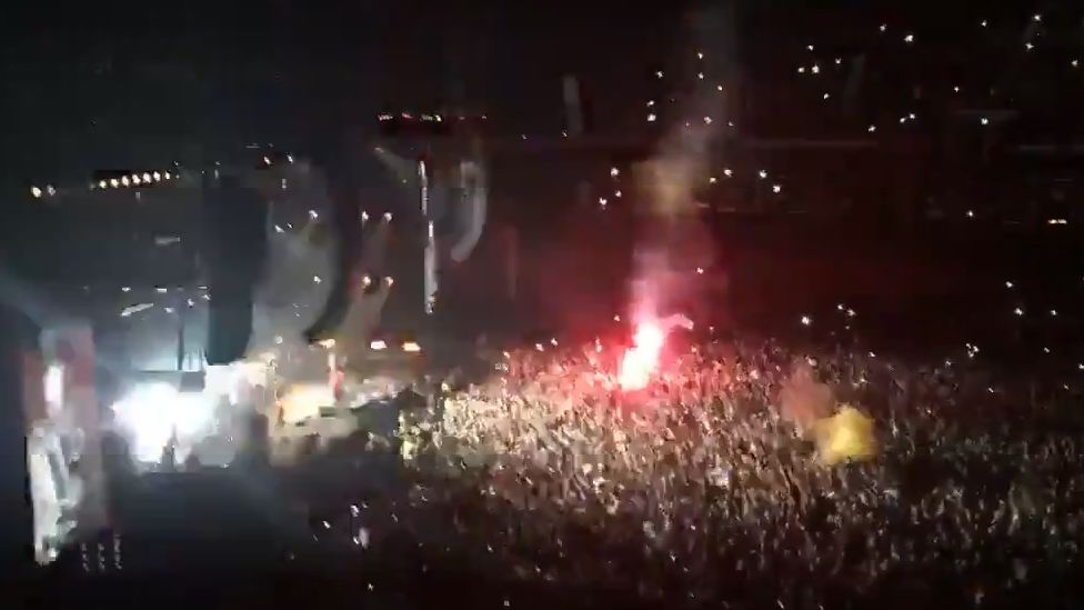 The flare was set off at the start of the concert