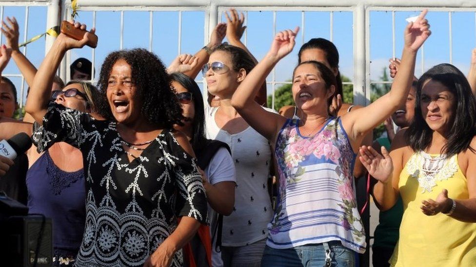 Relatives of military police officers block the main entrance of police headquarters, during a police strike over wages, in Vitoria, Espirito Santo, Brazil February 11, 2017